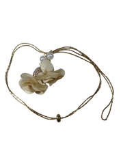 Necklace with floral design and beads on a white background